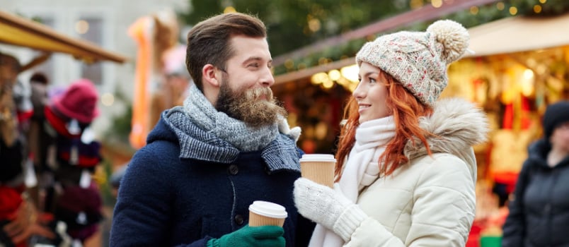 Young couple having coffee outdoor 